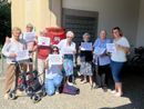 Saluzzo, ospiti del Tapparelli adottano al classica  buca rossa delle lettere presso la sede degli Uffici postali