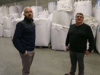 Simone e Corrado in uno dei magazzini di stoccaggio delle confezioni