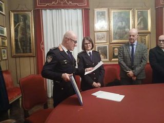 Momenti della conferenza stampa, della consegna dell'onorificenza a Maria Grazia Pallo e della messa del Santo Patrono della Polizia locale