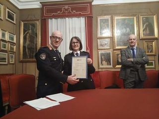 Momenti della conferenza stampa, della consegna dell'onorificenza a Maria Grazia Pallo e della messa del Santo Patrono della Polizia locale