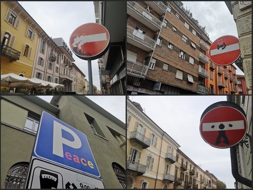 A Cuneo segnali stradali modificati ad opera d’arte parlano di pace, ambiente e diritti nello stile di Clet Abraham [FOTO]