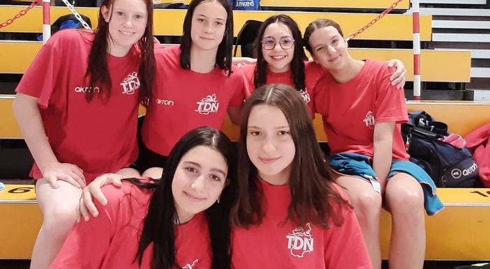 (foto - pagina fb team dimensione nuoto)