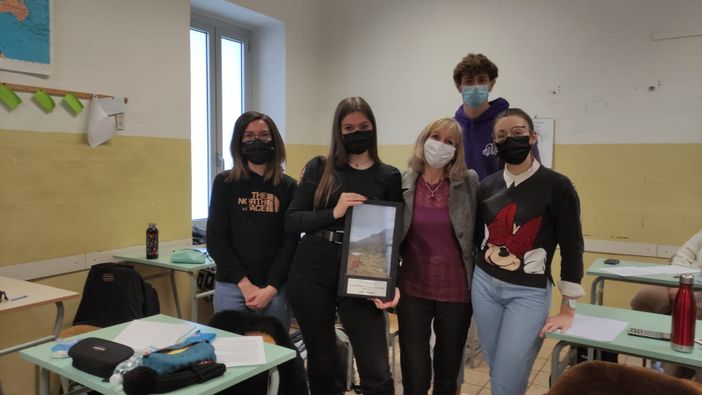 Uno dei momenti della premiazione, e le foto vincitrici