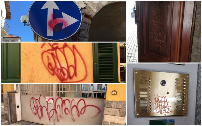 Vandali in azione nella notte a Fossano: graffiti su muri e portoni del centro storico Vandali in azione nella notte a Fossano: graffiti su muri e portoni del centro storico