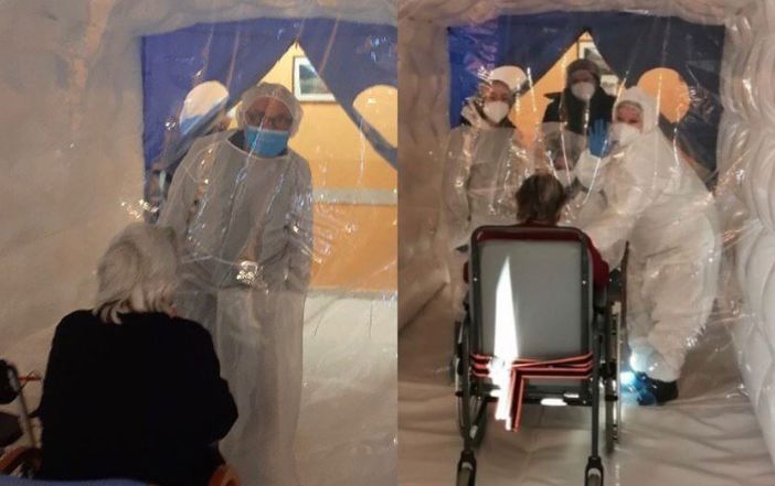 Il sindaco Roattino e la famiglia della signora Patrizia dentro la stanza degli abbracci