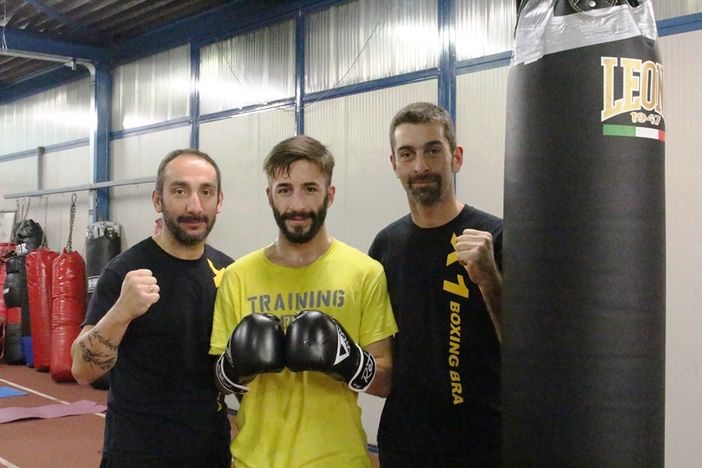 Il braidese Luca Ratti con i suoi allenatori