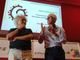 L'artista Coco Cano e Claudio Olivero, presidente di Banca di Cherasco