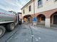 Il trattore finito contro i portici a Cardè. nelle altre foto i danni al portico