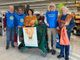 Saluzzo, il presidente Luigi Fassino e rotazriani Saluzzo al Mercatò per la Colletta Alimentare
