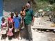 Padre Massimo Miraglio con i bimbi di Haiti