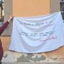 Lo striscione affisso al Da Vinci di Alba