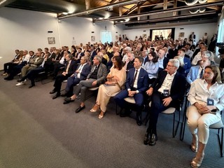 Alcuni momenti dell'assemblea (foto Mauro Gallo)
