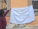Lo striscione affisso al Da Vinci di Alba
