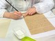 La lettera in fase di restauro