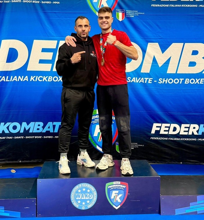 Andrea Alladio con l'allenatore Simone Concu