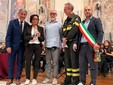 Giuliana e Pierangelo Roascio figli di Alfredo a cui va la Medaglia d'Onore Giuliana e Pierangelo Roascio figli di Alfredo a cui va la Medaglia d'Onore