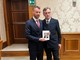 Nicola Cotti e Stefano De Carolis con il libro dedicato a Chiaffredo Bergia Nicola Cotti e Stefano De Carolis con il libro dedicato a Chiaffredo Bergia