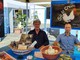 Paolo Viano e Angelo Borgognone in uno stand di promozione stand della "Gallina Bianca di Saluzzo"