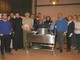 La cena di solidarietà &quot; Aspettando il Natale&quot; del Rotary Saluzzo nella sede Caritas con il presidente Luigi Musacchio e il vescovo Cristiano Bodo
