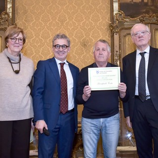 Nella foto di Matteo Secci, da sinistra, la consigliera segretaria dell’Ordine dei Giornalisti piemontesi Maria Teresa Martinengo, Il presidente Stefano Tallia, Giampaolo Testa e il vicepresidente Ezio Ercole