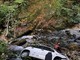 L'auto della donna recuperata nel greto del torrente Grana