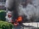 L'auto in fiamme nello scatto pubblicato da Elisa Motta sul gruppo Facebook &quot;Sei di Alba se...&quot;