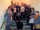 Il vescovo Cristiano Bodo e i volontari dell'Emporio solidale Caritas