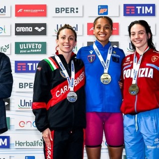 Al centro la 19enne Curtis oro nei Farfalla (foto  da Fin.it Giorgio Scala / Deep Blue Media)