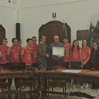 Nella foto: la premiazione nella sala Giolitti della Provincia di Cuneo dell'Auxilium Saluzzo con il consigliere provinciale Simone Manzone
